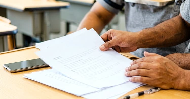 Young person receiving a job application response on their phone