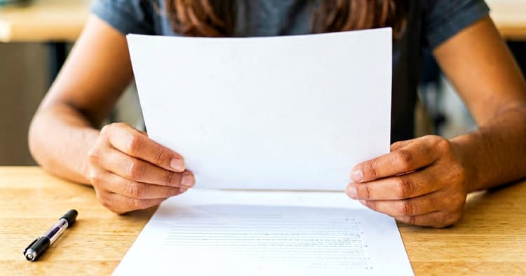 Resume sheet being corrected on a table