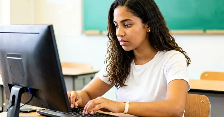 Young person undergoing professional computer training