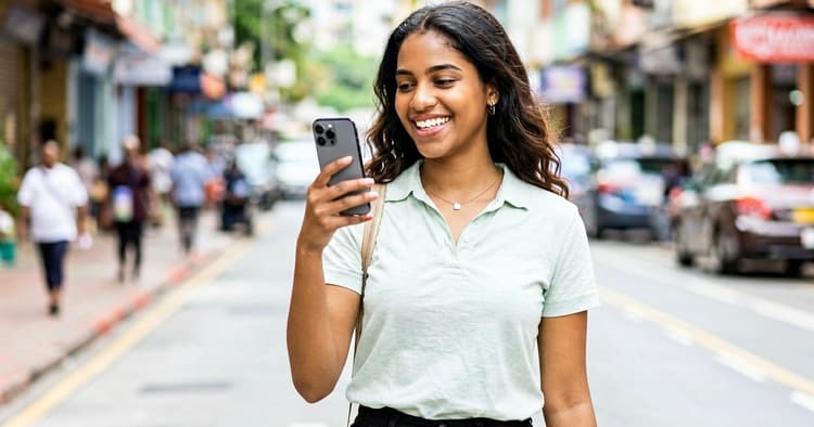 Young person receiving job application response on mobile phone