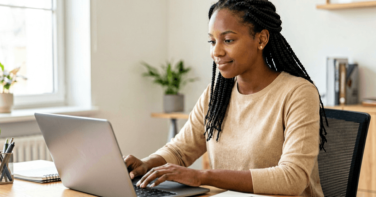 Mozambican female professional on a telework video call in a bright home office